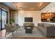 Modern living room with sleek furniture, a flat-screen TV, and an open layout at 353 E Bonneville Ave # 183/283, Las Vegas, NV 89101