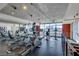 Well equipped gym with treadmills and elliptical machines offering panoramic views of the city at 353 E Bonneville Ave # 375, Las Vegas, NV 89101