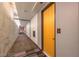 Modern hallway entrance featuring apartment number and neutral color palette at 353 E Bonneville Ave # 375, Las Vegas, NV 89101