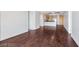 Open living room boasts sleek hardwood flooring and an open concept design that leads to the kitchen at 353 E Bonneville Ave # 375, Las Vegas, NV 89101