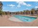 Beautiful community swimming pool with palm trees and inviting atmosphere at 353 E Bonneville Ave # 375, Las Vegas, NV 89101