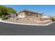 Corner home with desert landscaping and retaining wall at 4016 Balsam Mountain St, Las Vegas, NV 89129