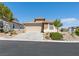 Charming single-story home featuring a two-car garage and low-maintenance desert landscaping at 4016 Balsam Mountain St, Las Vegas, NV 89129
