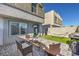 Cozy backyard with an outdoor seating area, grill, and privacy fence at 4278 Lemay St # 2, Las Vegas, NV 89115
