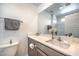 Modern bathroom featuring a large mirror, sleek countertop, and shower at 4278 Lemay St # 2, Las Vegas, NV 89115