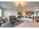 Stylish living room showcasing an open floor plan with a kitchen, seating area, and modern finishes at 4278 Lemay St # 2, Las Vegas, NV 89115