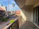 Balcony with a railing, showing lush landscaping and palm trees at 4370 Sandy River Dr # 24, Las Vegas, NV 89103