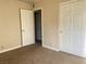Cozy bedroom with carpet flooring and a large closet at 4370 Sandy River Dr # 24, Las Vegas, NV 89103