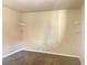 Small bedroom featuring carpet, base trim and shelving at 4370 Sandy River Dr # 24, Las Vegas, NV 89103