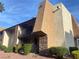 Attractive condo with a private balcony, accented by stone and well manicured shrubbery at 4370 Sandy River Dr # 24, Las Vegas, NV 89103