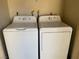 Convenient laundry area featuring a side-by-side washer and dryer for easy laundry access at 4370 Sandy River Dr # 24, Las Vegas, NV 89103