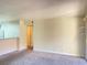 Cozy living room with neutral carpet and paint, ready for personal touches at 4370 Sandy River Dr # 24, Las Vegas, NV 89103