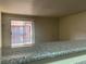 Open-concept living space with a breakfast bar, perfect for entertaining and relaxation at 4370 Sandy River Dr # 24, Las Vegas, NV 89103