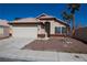 Charming single-story home featuring a two-car garage and low-maintenance landscaping at 5200 Brookmere Dr, Las Vegas, NV 89130