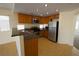 Well-lit kitchen featuring stainless steel appliances and granite countertops at 5200 Brookmere Dr, Las Vegas, NV 89130
