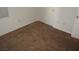 A bedroom featuring neutral carpeting and a closet with a sliding door at 5481 Railroad River Ave, Las Vegas, NV 89139