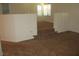 Bonus room showcases neutral carpet and walls and an open doorway at 5481 Railroad River Ave, Las Vegas, NV 89139