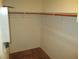 A closet featuring minimal contents and carpeted flooring at 5481 Railroad River Ave, Las Vegas, NV 89139