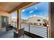 Relaxing balcony featuring outdoor seating with views of the surrounding neighborhood at 5946 Ancient Peaks Ave, Las Vegas, NV 89141