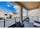 Private balcony with comfortable seating and views of the neighborhood at 5946 Ancient Peaks Ave, Las Vegas, NV 89141