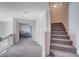 Upstairs hallway features carpeting and leads to bedrooms and other living areas in the home at 5946 Ancient Peaks Ave, Las Vegas, NV 89141