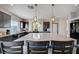 Updated kitchen featuring granite counters, stainless appliances, and pendant lighting over the island at 5946 Ancient Peaks Ave, Las Vegas, NV 89141