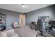 Functional office space featuring neutral colors, a dedicated desk, and seating for guests at 5946 Ancient Peaks Ave, Las Vegas, NV 89141