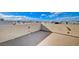 Spacious rooftop deck with stucco walls, perfect for entertaining and enjoying panoramic views at 5946 Ancient Peaks Ave, Las Vegas, NV 89141