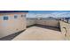 Large rooftop deck featuring a finished surface, stucco walls, and mounted outdoor lights at 5946 Ancient Peaks Ave, Las Vegas, NV 89141