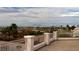 Railing view featuring distant city buildings and mountain backdrop at 6915 Cedar Basin Ave, Las Vegas, NV 89142