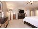Spacious bedroom with carpet, closet, dresser and sleek furnishings at 6915 Cedar Basin Ave, Las Vegas, NV 89142