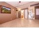 Hallway with tile flooring provides access to bedrooms and bathrooms at 6915 Cedar Basin Ave, Las Vegas, NV 89142