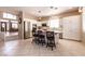 Well-lit kitchen with a large island, stainless steel appliances, and ample cabinet space at 6915 Cedar Basin Ave, Las Vegas, NV 89142