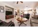 Cozy living room with tiled flooring and comfortable seating arrangements at 6915 Cedar Basin Ave, Las Vegas, NV 89142