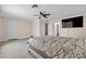 Bedroom with a TV and ensuite bathroom at 7425 Enchanted Hills Ct, Las Vegas, NV 89129