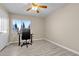 Bedroom featuring a desk with a window view at 7425 Enchanted Hills Ct, Las Vegas, NV 89129