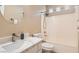 Clean bathroom featuring modern vanity, sink, toilet, and bathtub with shower combination at 7690 Blue Whirlpool St, Las Vegas, NV 89131