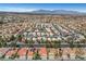Scenic aerial view of a well-planned community boasting lush green trees and uniform architecture at 8132 Bay Harbor Dr, Las Vegas, NV 89128