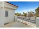 Balcony view overlooking the street, showcasing a tiled roof and neighborhood greenery at 8132 Bay Harbor Dr, Las Vegas, NV 89128