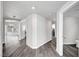 Hallway features neutral paint, hard wood floors and ample lighting at 8132 Bay Harbor Dr, Las Vegas, NV 89128
