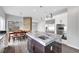Contemporary kitchen featuring stainless steel appliances, a large island, and plenty of cabinet space at 8132 Bay Harbor Dr, Las Vegas, NV 89128
