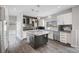 Bright and airy kitchen with an island, sleek cabinets, stainless steel appliances, and modern finishes at 8132 Bay Harbor Dr, Las Vegas, NV 89128