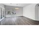 Spacious living room with plenty of natural light, neutral walls, and dark flooring at 8132 Bay Harbor Dr, Las Vegas, NV 89128