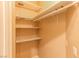 Walk-in closet with built-in shelving, and neutral decor at 9849 Ridge Hill Ave, Las Vegas, NV 89147
