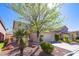 Inviting two-story home featuring mature landscaping and a spacious two-car garage at 9849 Ridge Hill Ave, Las Vegas, NV 89147