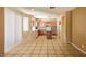 Spacious eat-in kitchen features light wood cabinets, tile floors and natural light at 9849 Ridge Hill Ave, Las Vegas, NV 89147