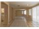 The kitchen is connected to additional rooms, offering ample counter space, granite and appliances at 9849 Ridge Hill Ave, Las Vegas, NV 89147