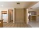 Spacious living area with tiled floors, neutral walls, and ample room for furniture at 9849 Ridge Hill Ave, Las Vegas, NV 89147