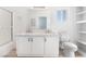 Bright bathroom with double sink vanity, shower/tub, and ample shelving at , Las Vegas, NV 89156