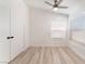 This bedroom has a ceiling fan, natural light, and closet at , Las Vegas, NV 89156